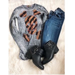 Grey long sleeved skull shirt